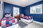 This room is perfect for the kids with its two twin beds